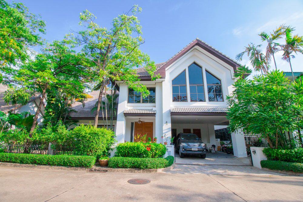 The family's homes at Nichada Thani — house and garden